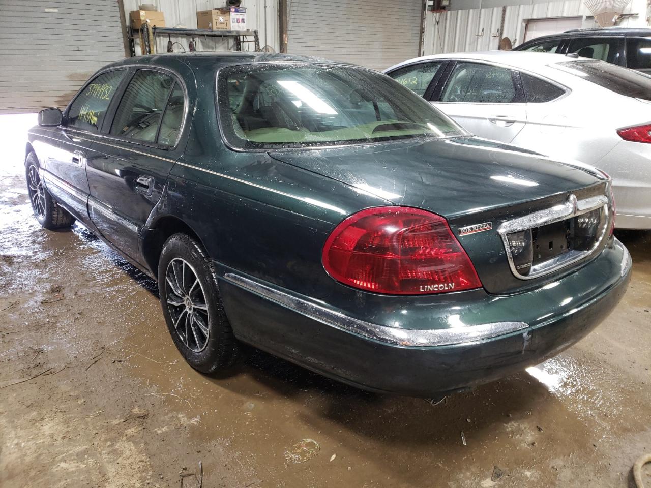 Photo 3 from auction – 2002 LINCOLN CONTINENTA with VIN 1LNHM97VX2Y691907