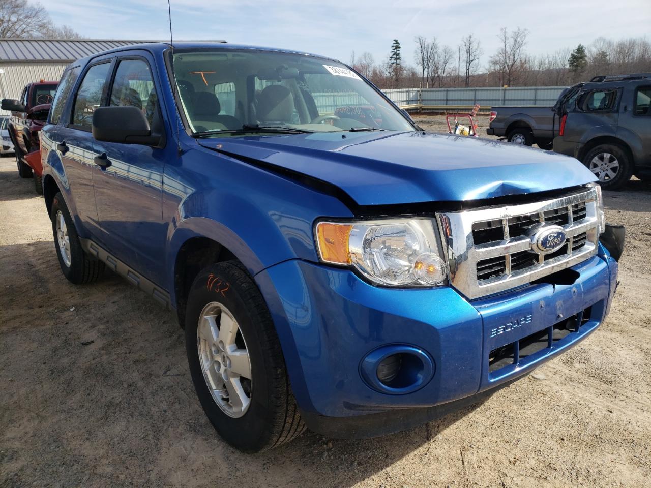 FORD ESCAPE XLS 2011 with VIN 1FMCU0C71BKA60852 - Photo from auction