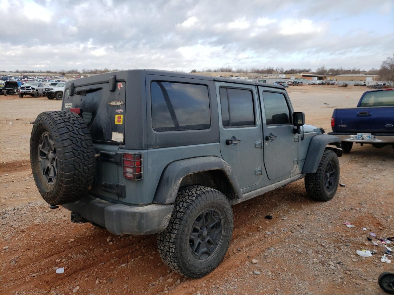 Photo 4 from auction – 2014 JEEP WRANGLER U with VIN 1C4BJWFG5EL120461