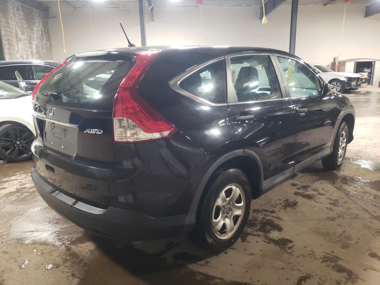 Photo 4 from auction – 2014 HONDA CR-V LX with VIN 2HKRM4H37EH679678