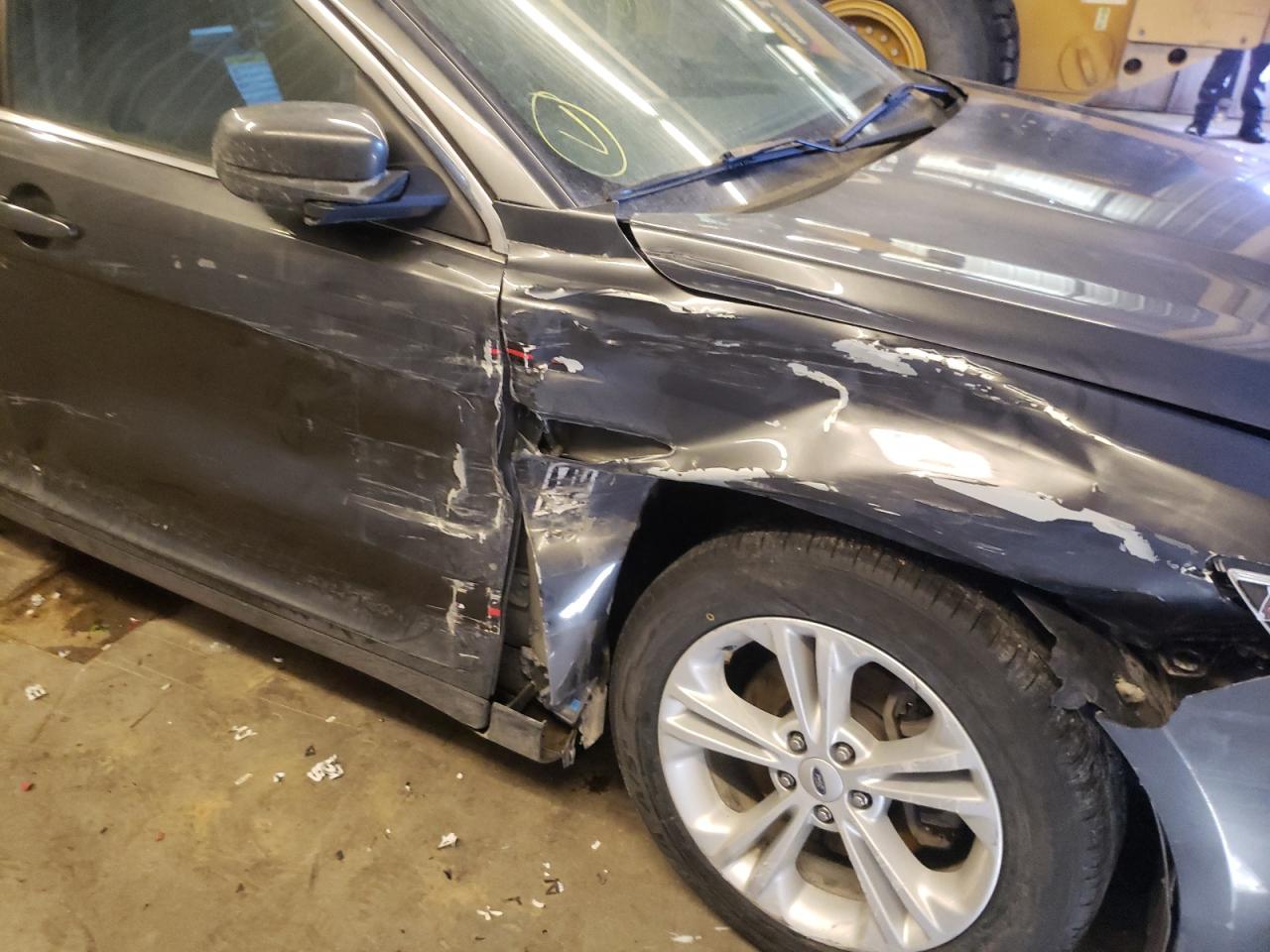 Photo 9 from auction – 2015 FORD TAURUS SEL with VIN 1FAHP2E87FG175165