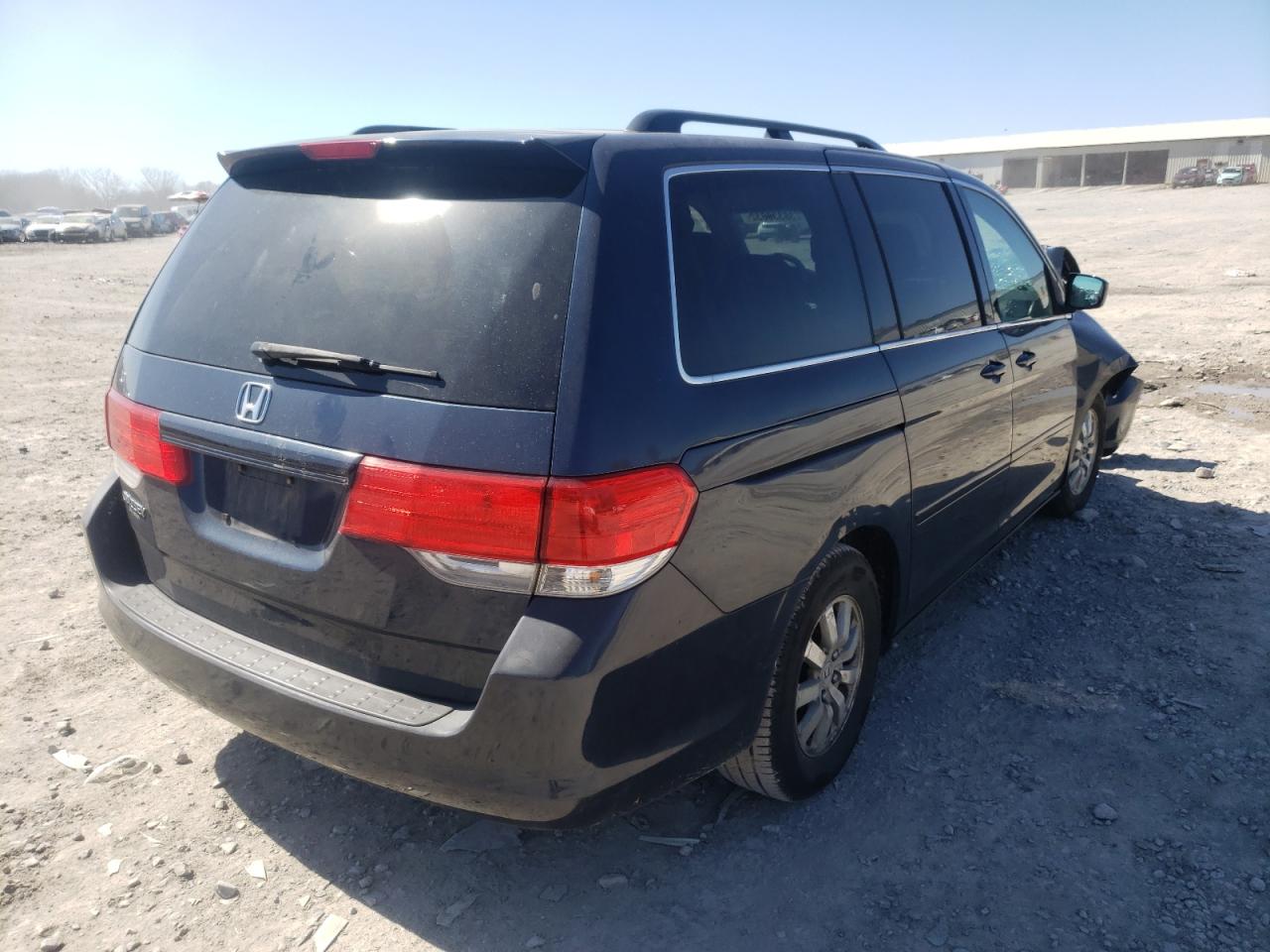 Photo 4 from auction – 2010 HONDA ODYSSEY EX with VIN 5FNRL3H55AB067342