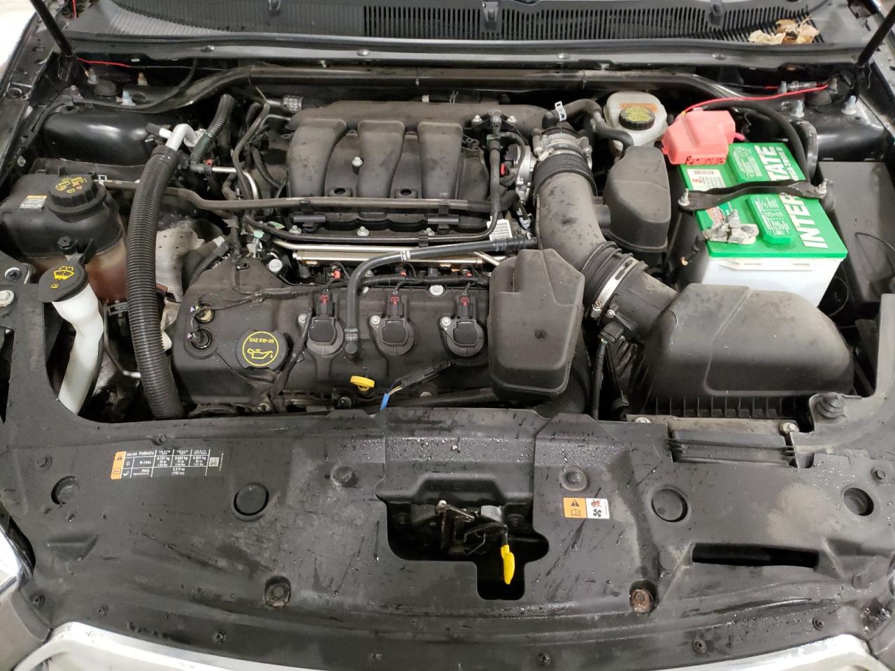 Photo 7 from auction – 2015 FORD TAURUS SEL with VIN 1FAHP2E87FG175165