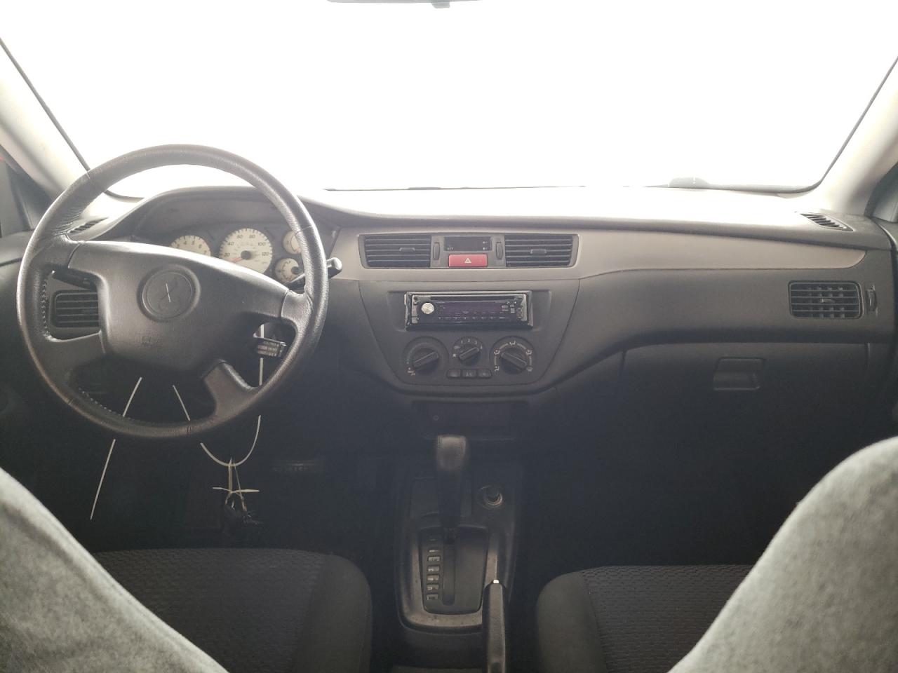 Photo 9 from auction – 2003 MITSUBISHI LANCER OZ with VIN JA3AJ86E43U036000
