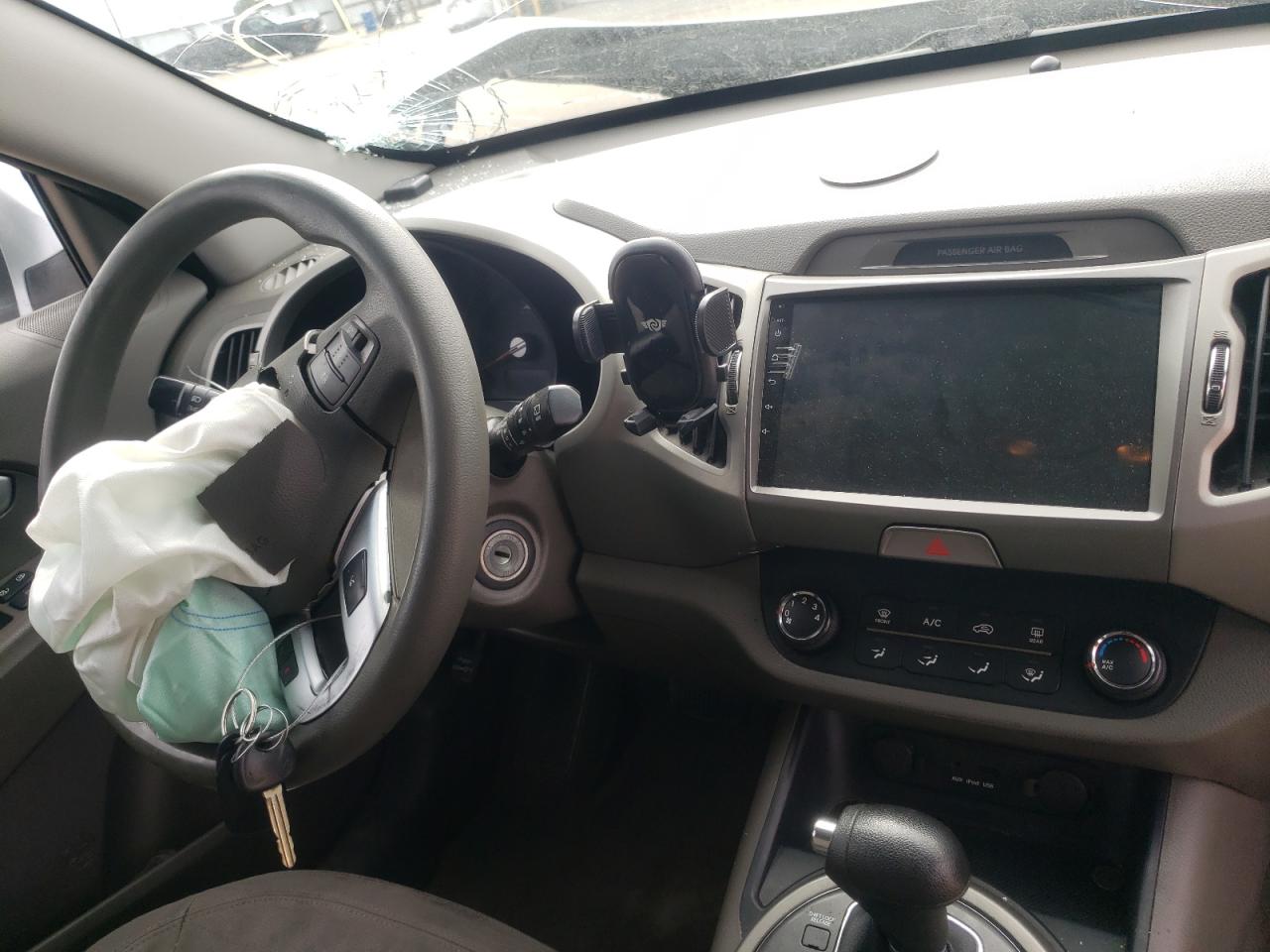 Photo 9 from auction – 2011 KIA SPORTAGE L with VIN KNDPBCA27B7080353