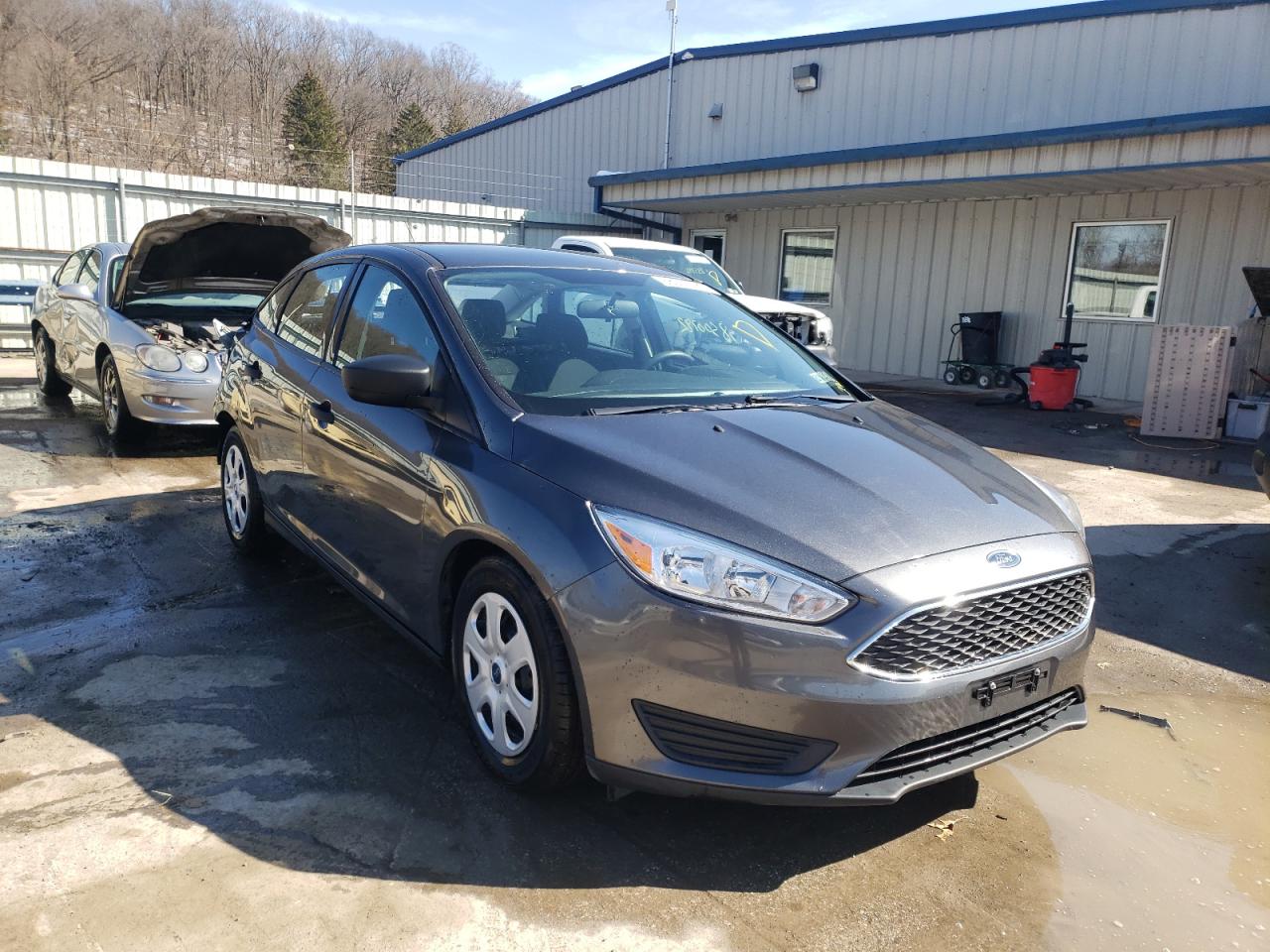 FORD FOCUS S 2018 with VIN 1FADP3E26JL330143 - Photo from auction