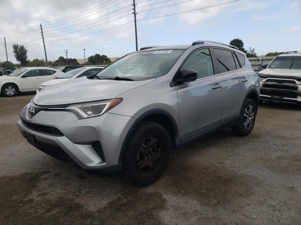 Photo 2 from auction – 2016 TOYOTA RAV4 LE with VIN 2T3ZFREV8GW242328