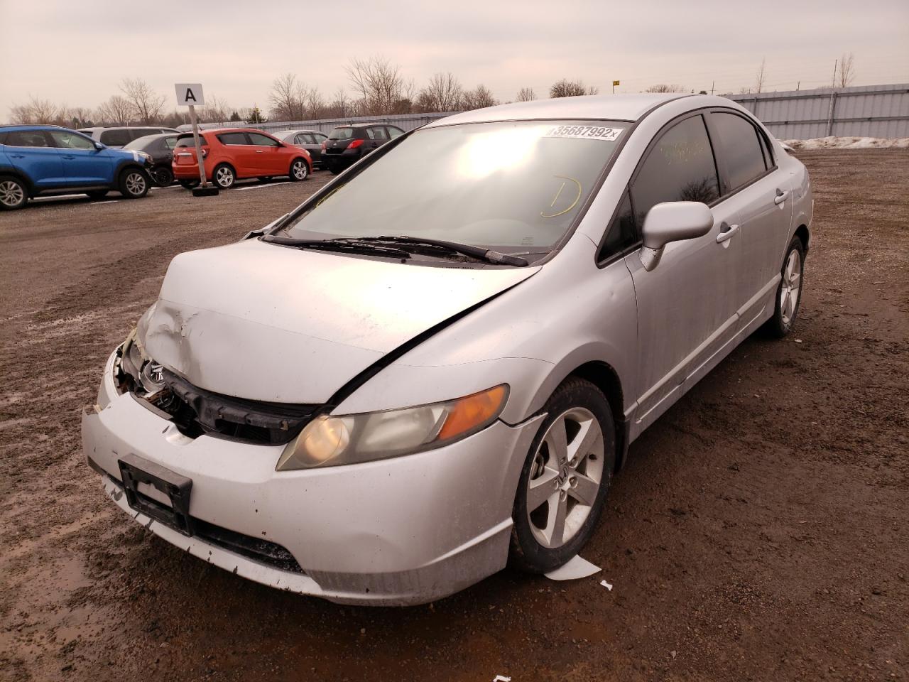 Photo 2 from auction – 2006 HONDA CIVIC LX with VIN 2HGFA16596H030474