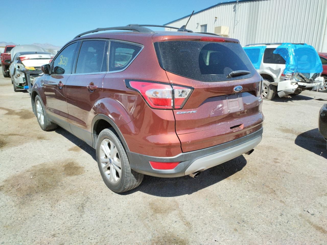Photo 3 from auction – 2018 FORD ESCAPE SE with VIN 1FMCU0GD8JUA86268