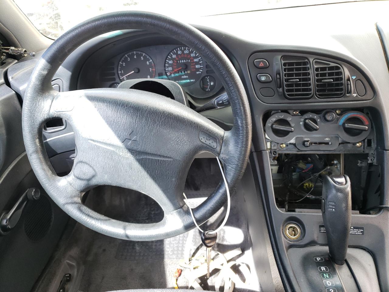 Photo 9 from auction – 1998 MITSUBISHI ECLIPSE RS with VIN 4A3AK34Y0WE120325