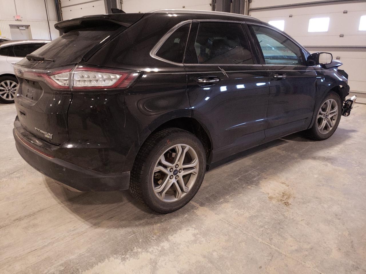Photo 4 from auction – 2015 FORD EDGE TITAN with VIN 2FMTK4K95FBB10216