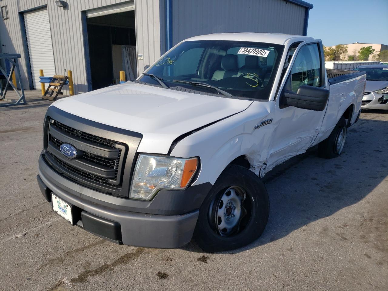 Photo 2 from auction – 2014 FORD F150 with VIN 1FTMF1CM4EKF88128