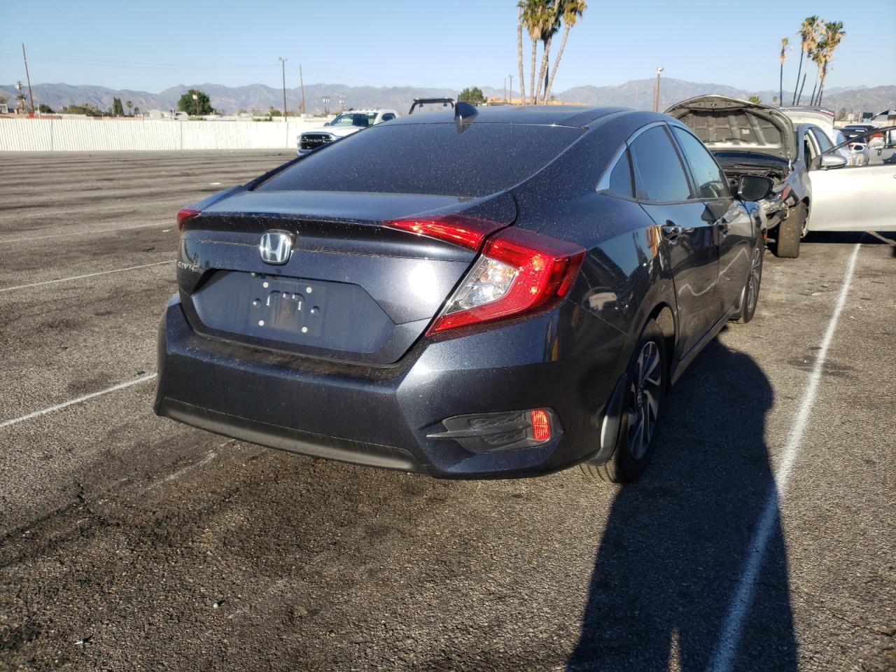 Photo 4 from auction – 2017 HONDA CIVIC EX with VIN 2HGFC2F73HH531834