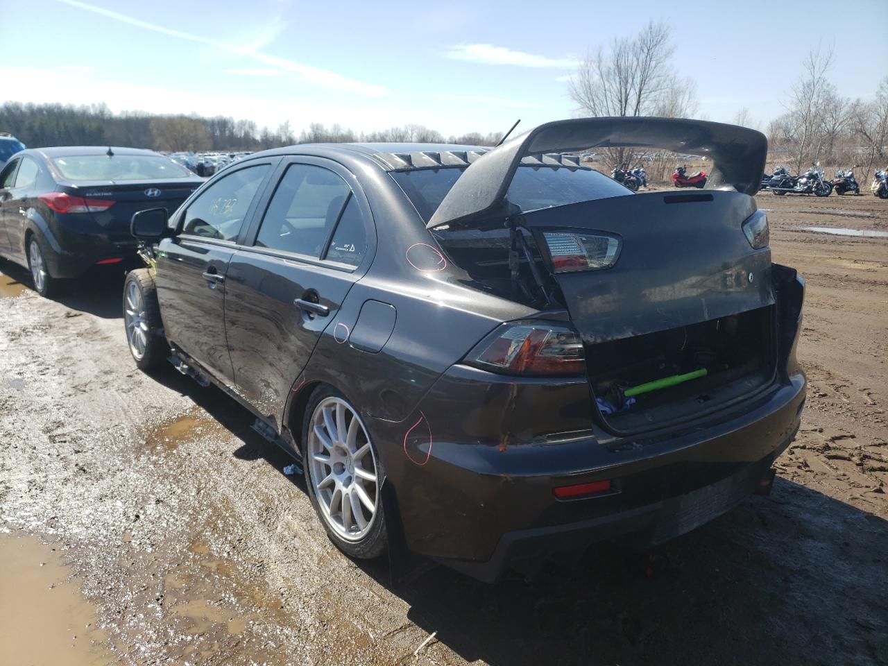 Photo 3 from auction – 2013 MITSUBISHI LANCER EVO with VIN JA32W8FV0DU011344