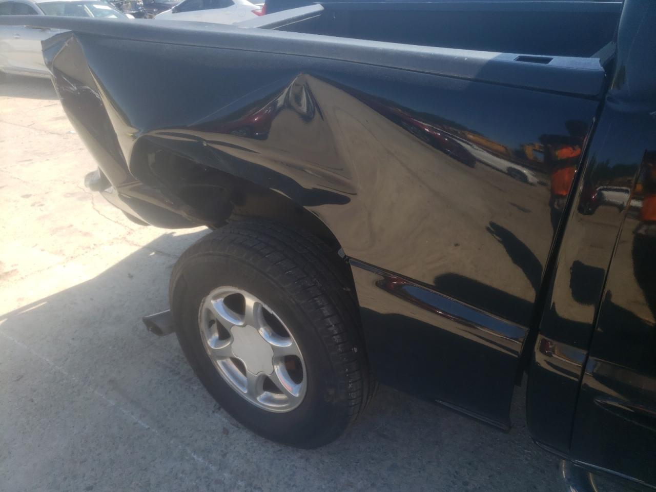 Photo 10 from auction – 2005 GMC SIERRA K15 with VIN 2GTEK63N451260844