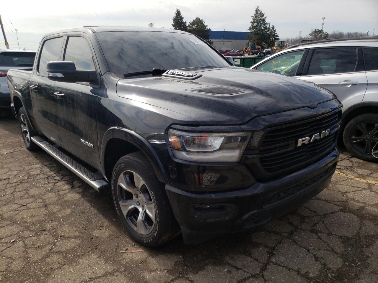 RAM 1500 LARAM 2019 with VIN 1C6SRFJT3KN697705 - Photo from auction