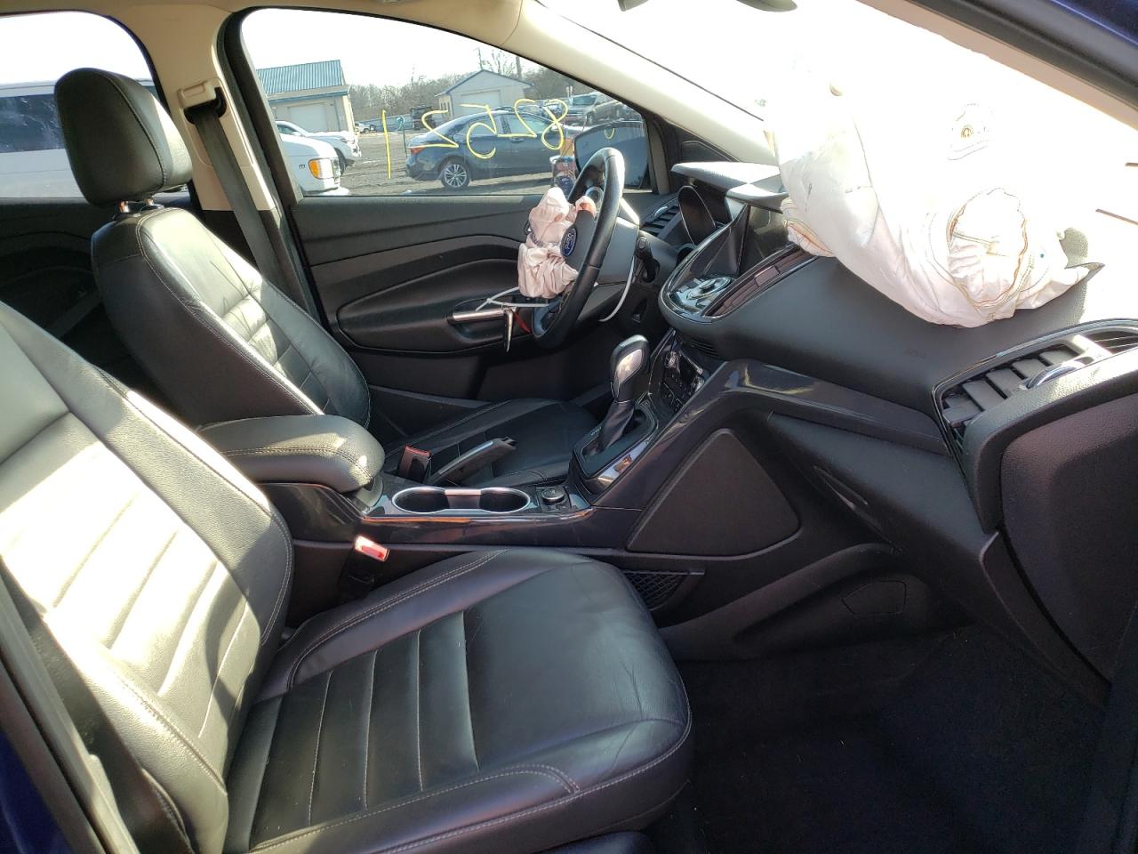Photo 5 from auction – 2016 FORD ESCAPE with VIN 1FMCU9J98GUA80438