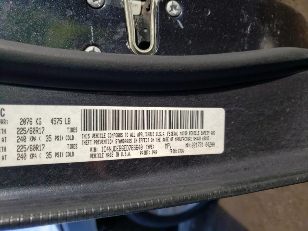 Photo 10 from auction – 2014 JEEP COMPASS LA with VIN 1C4NJDEB6ED765640