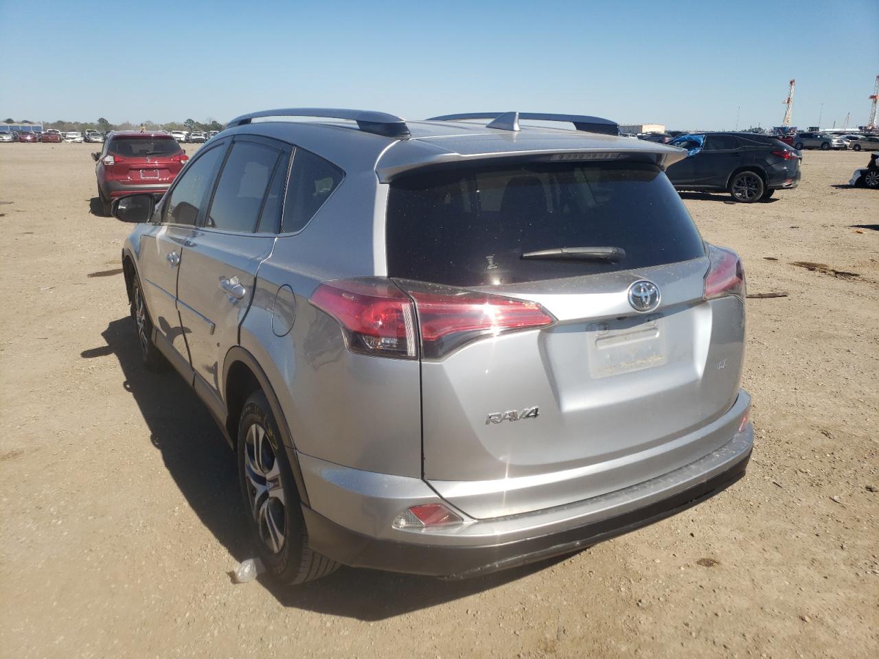 Photo 3 from auction – 2018 TOYOTA RAV4 LE with VIN JTMZFREV6JJ210922