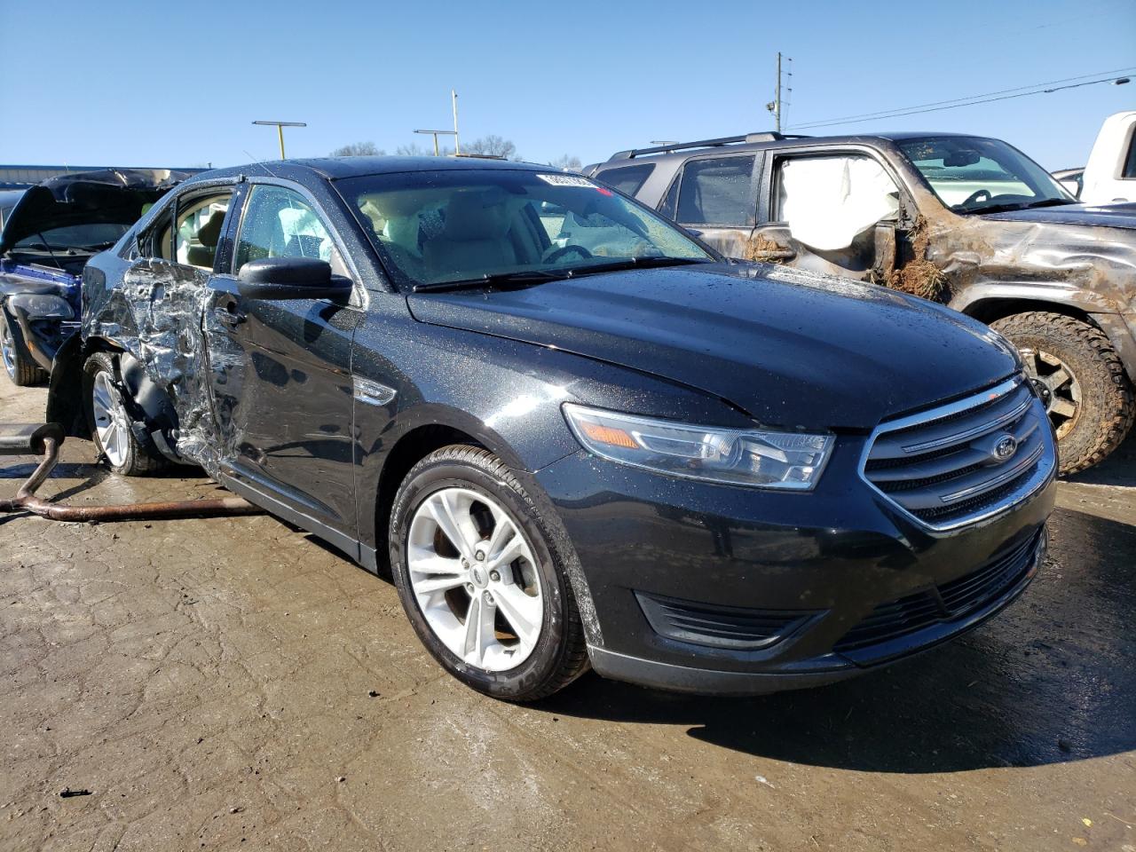 FORD TAURUS SE 2015 with VIN 1FAHP2D84FG199361 - Photo from auction