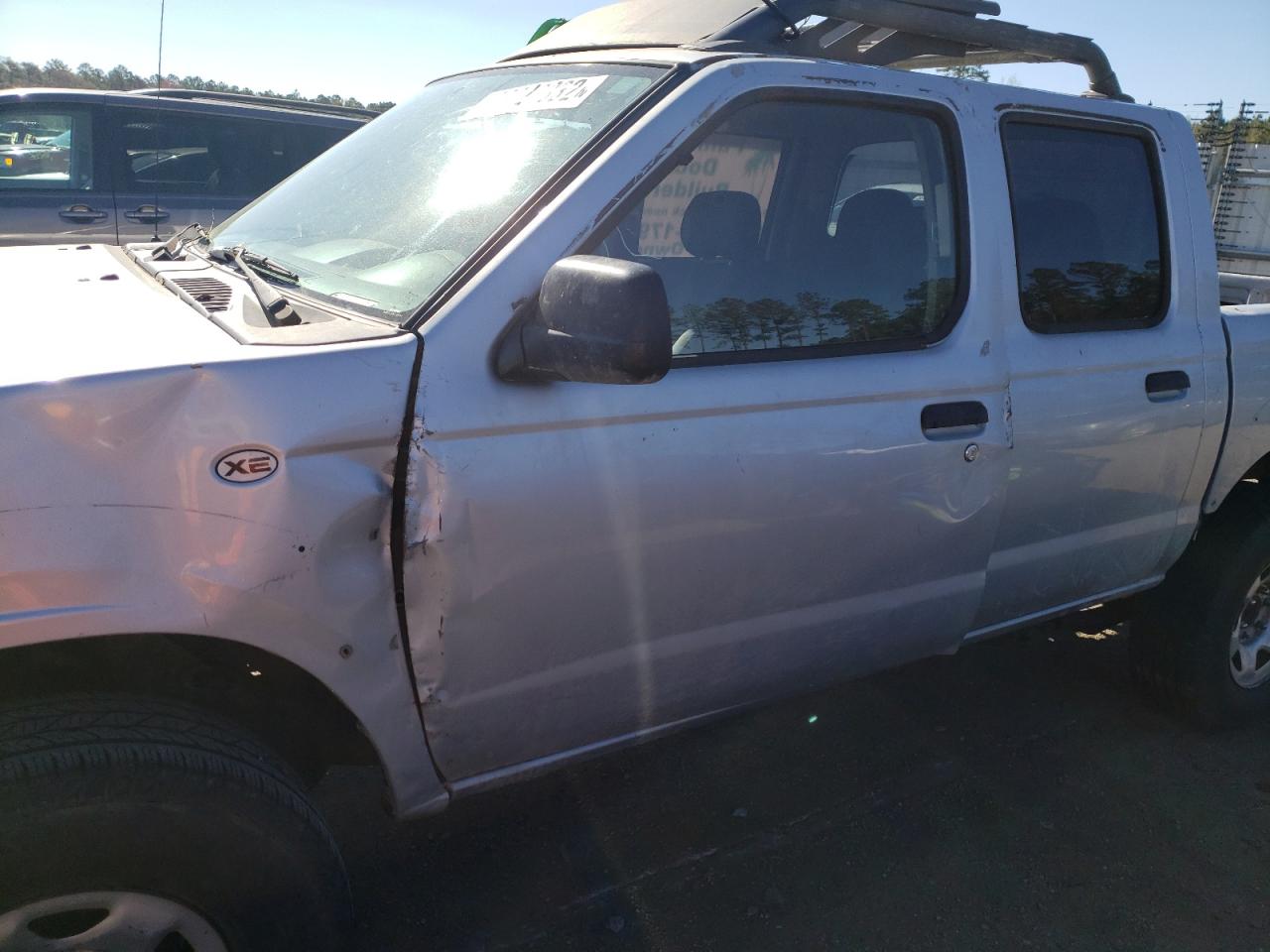 Photo 9 from auction – 2002 NISSAN FRONTIER C with VIN 1N6ED27T02C362012