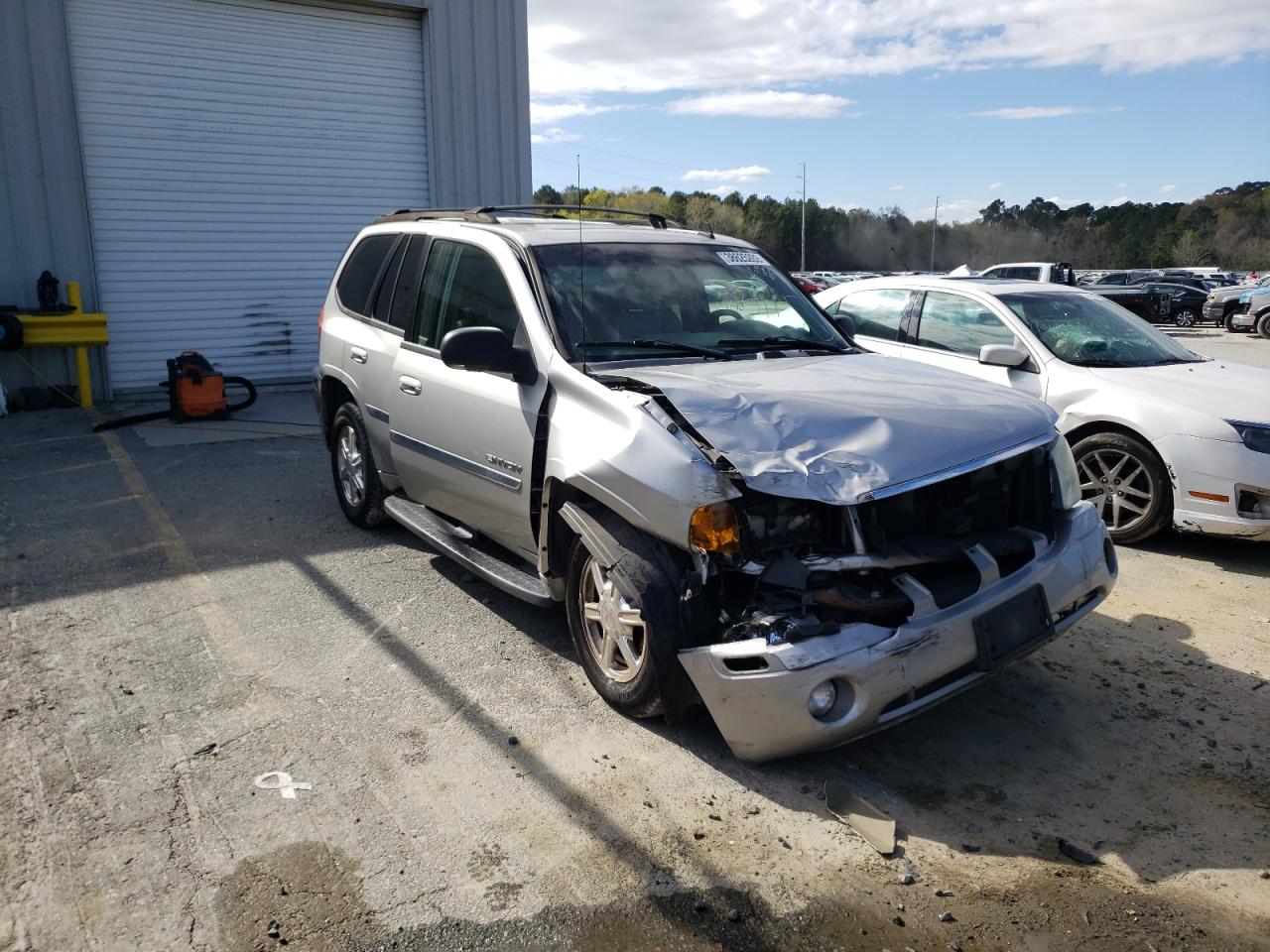 GMC ENVOY 2006 with VIN 1GKDS13S962256153 - Photo from auction