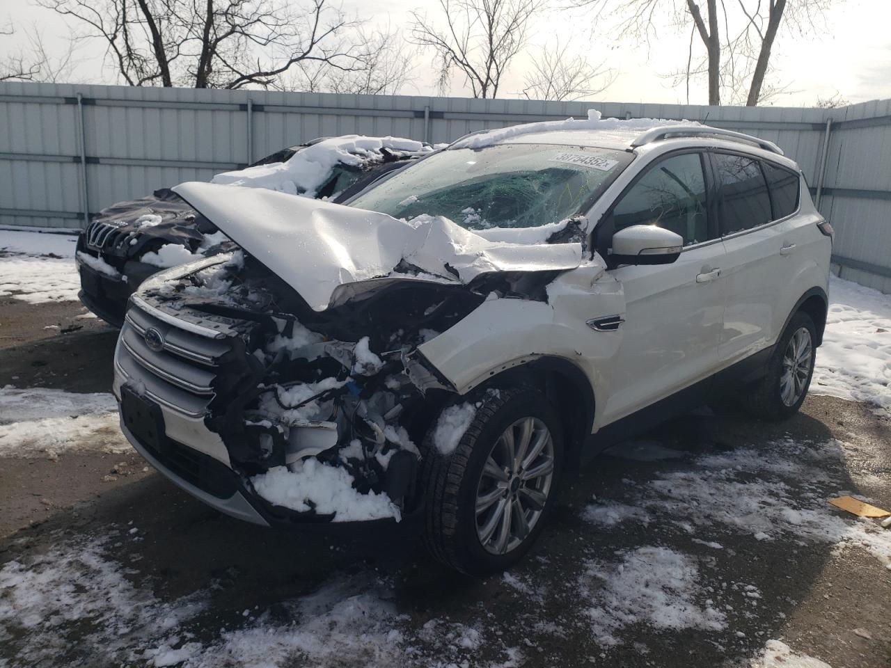 Photo 2 from auction – 2018 FORD ESCAPE TIT with VIN 1FMCU9J93JUC01531