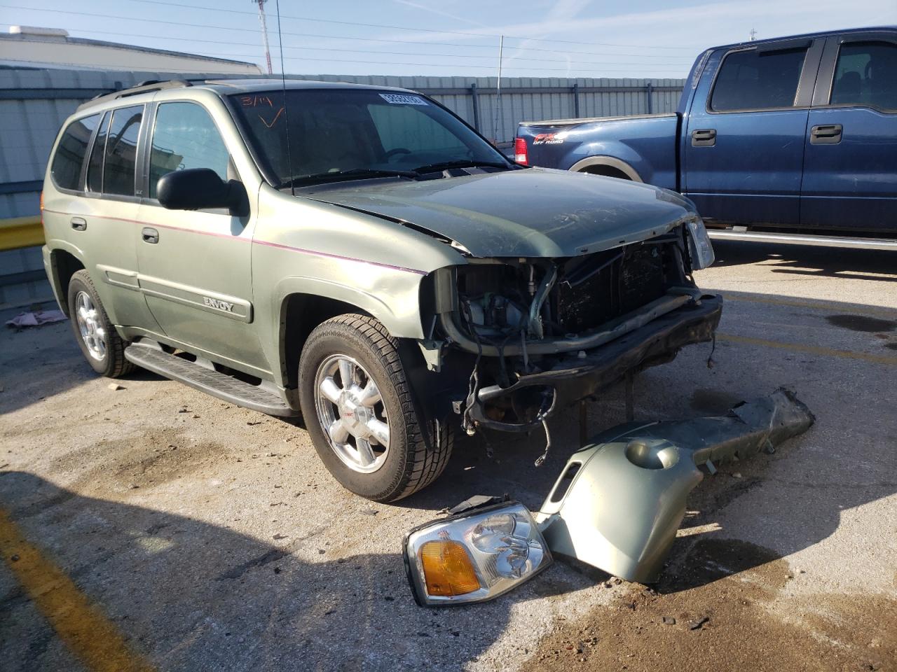 GMC ENVOY 2003 with VIN 1GKDT13S332311544 - Photo from auction