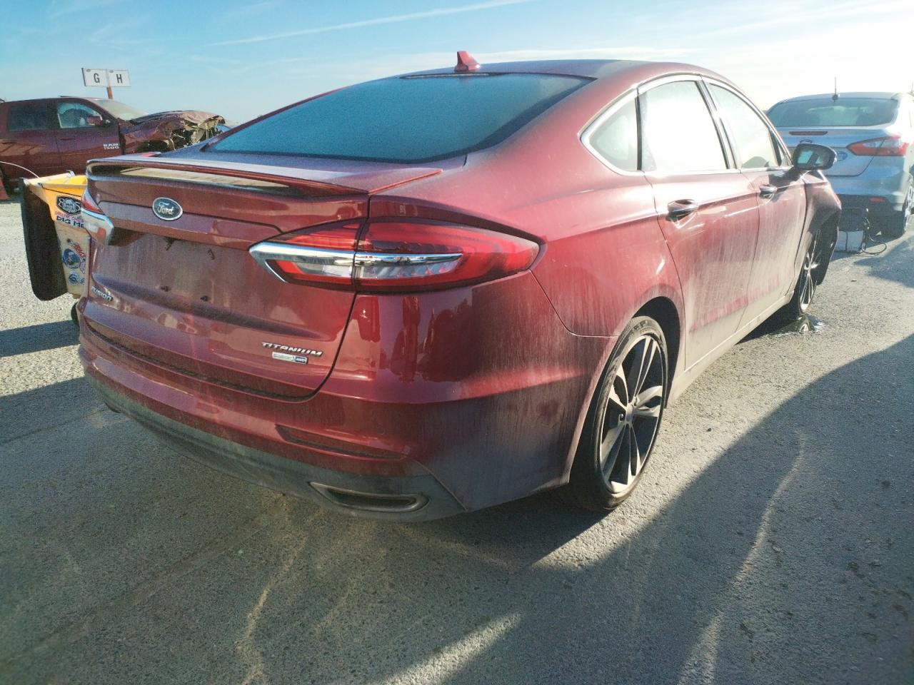 Photo 4 from auction – 2019 FORD FUSION TIT with VIN 3FA6P0D90KR143148
