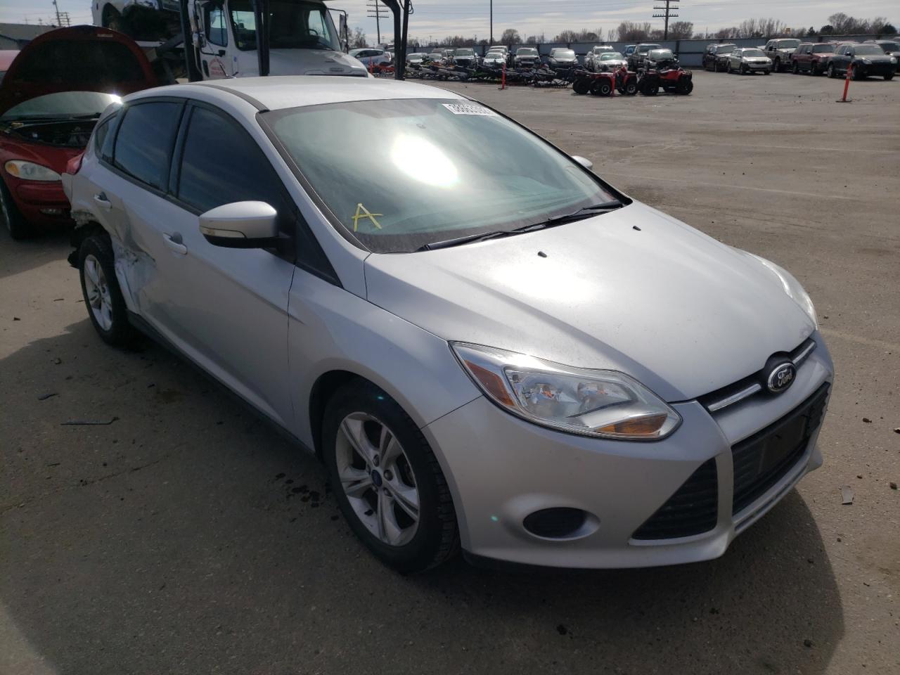 FORD FOCUS 2014 with VIN 1FADP3K22EL381858 - Photo from auction