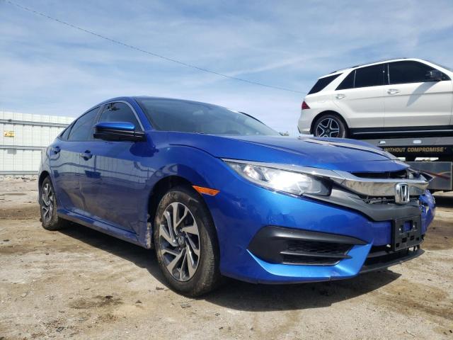 HONDA CIVIC EX 2018 with VIN 19XFC2F71JE012295 - Photo from auction