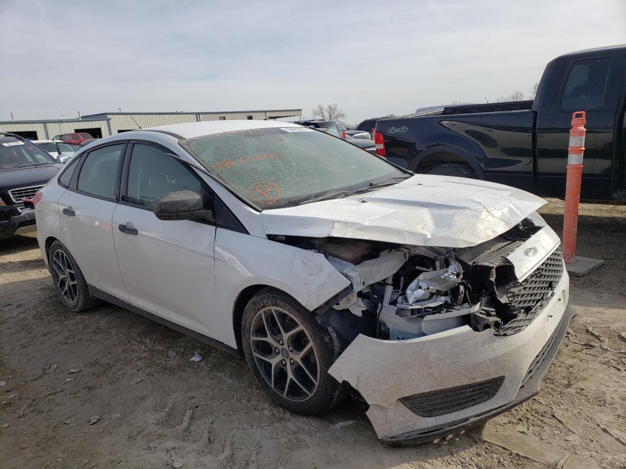 FORD FOCUS S 2015 with VIN 1FADP3E24FL375976 - Photo from auction