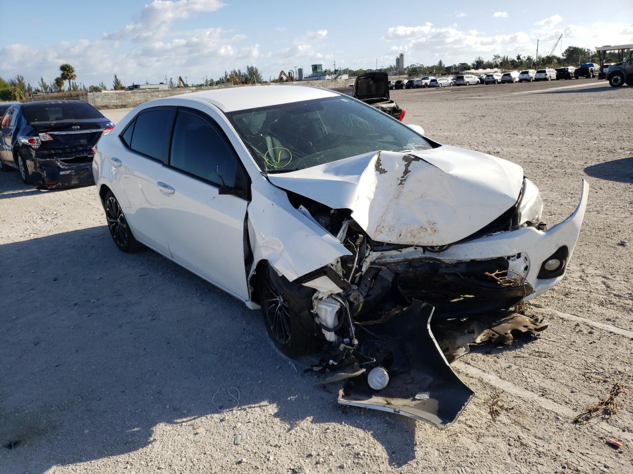 TOYOTA COROLLA L 2015 with VIN 5YFBURHE6FP245904 - Photo from auction