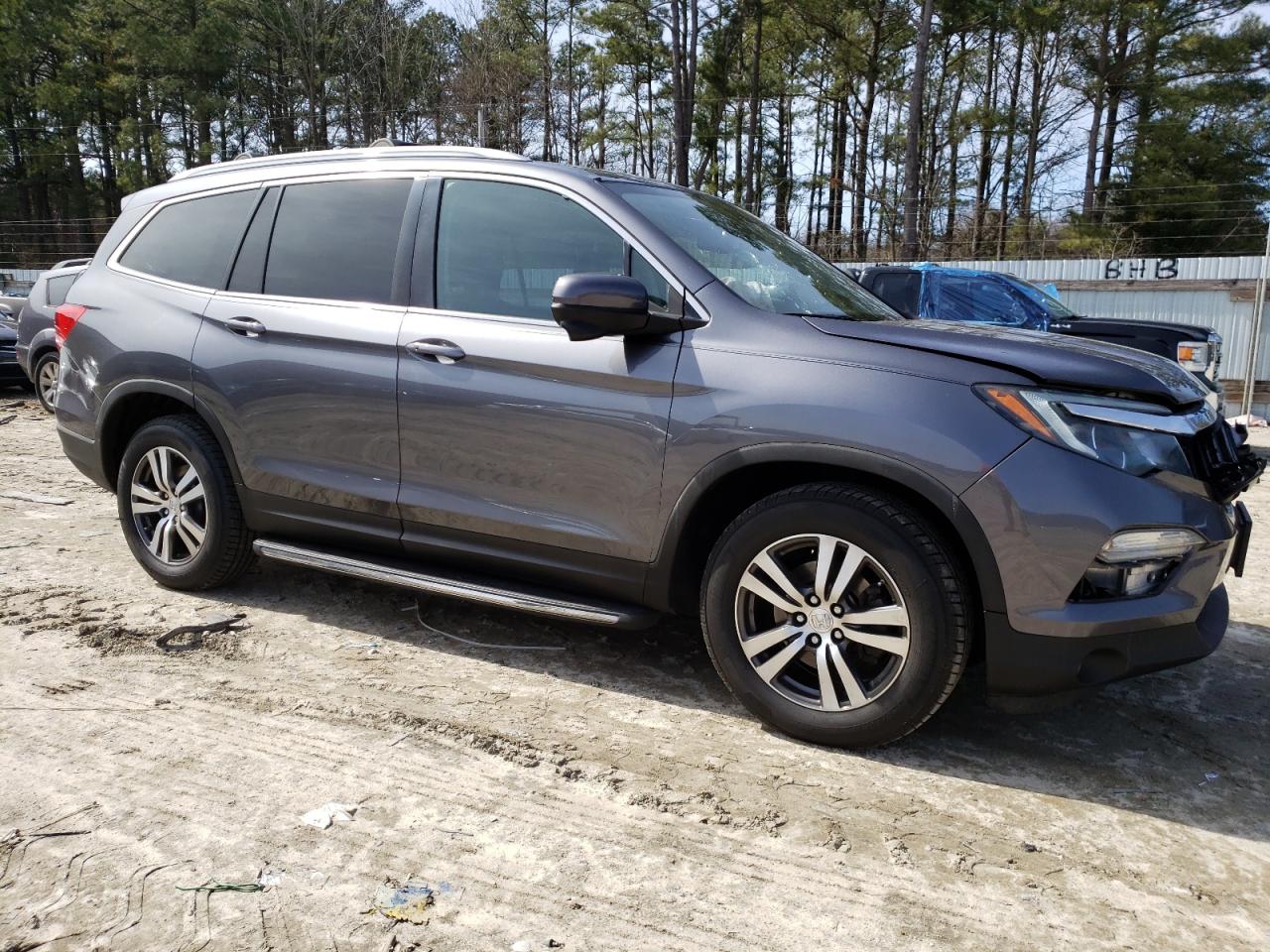 HONDA PILOT EXL 2016 with VIN 5FNYF6H59GB022885 - Photo from auction