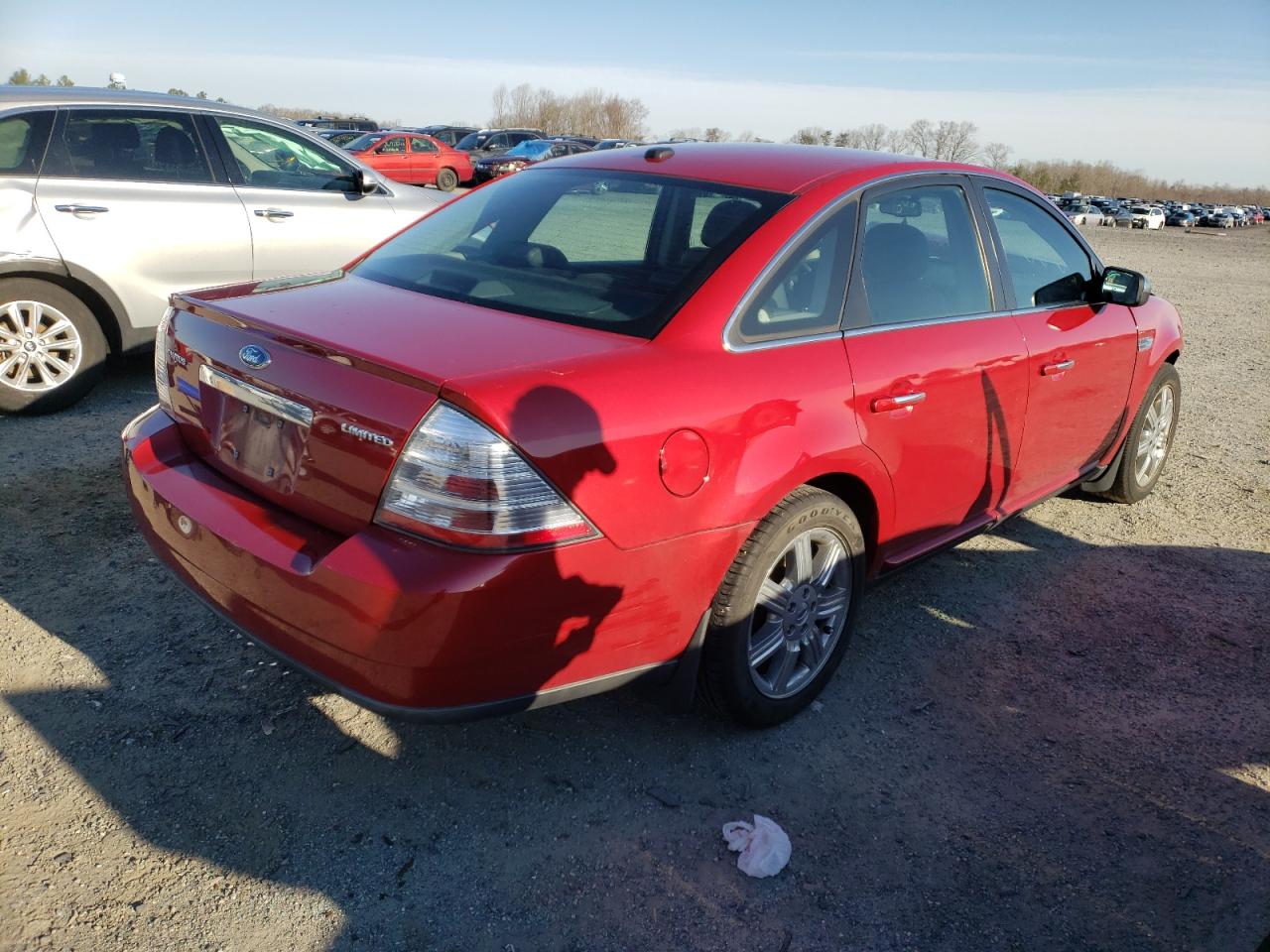 Photo 14 from auction – 2009 FORD TAURUS LIM with VIN 1FAHP25W09G109916