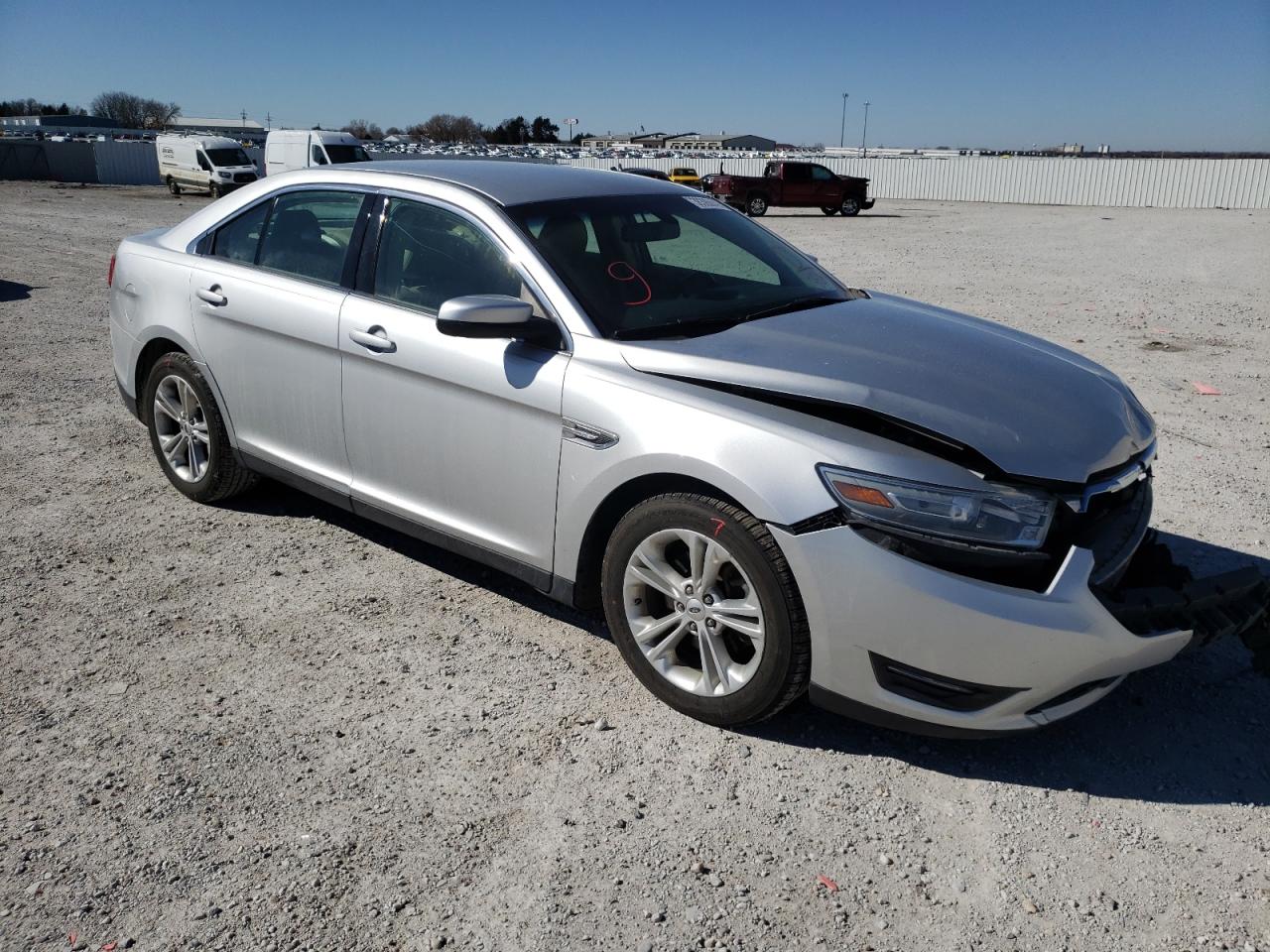 FORD TAURUS SEL 2014 with VIN 1FAHP2H8XEG103886 - Photo from auction