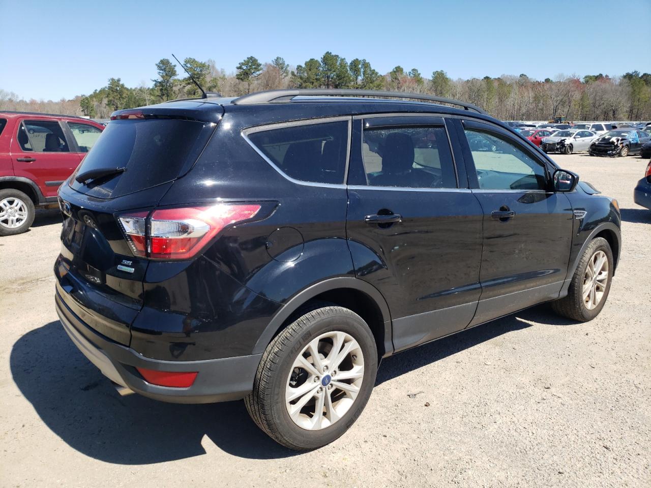 Photo 4 from auction – 2018 FORD ESCAPE SE with VIN 1FMCU0GDXJUB19562