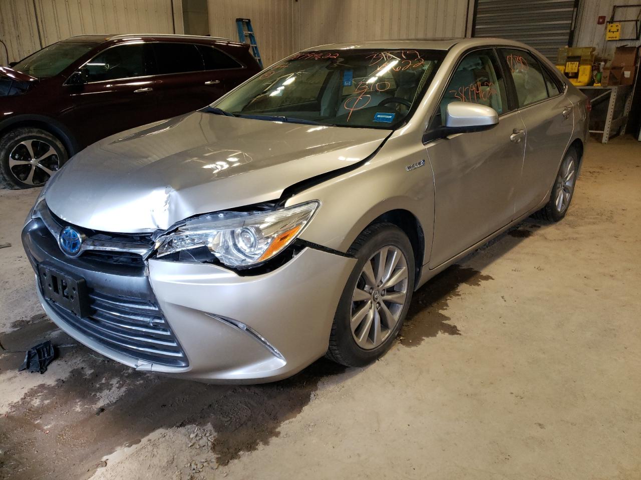 Photo 2 from auction – 2015 TOYOTA CAMRY HYBR with VIN 4T1BD1FK3FU169163