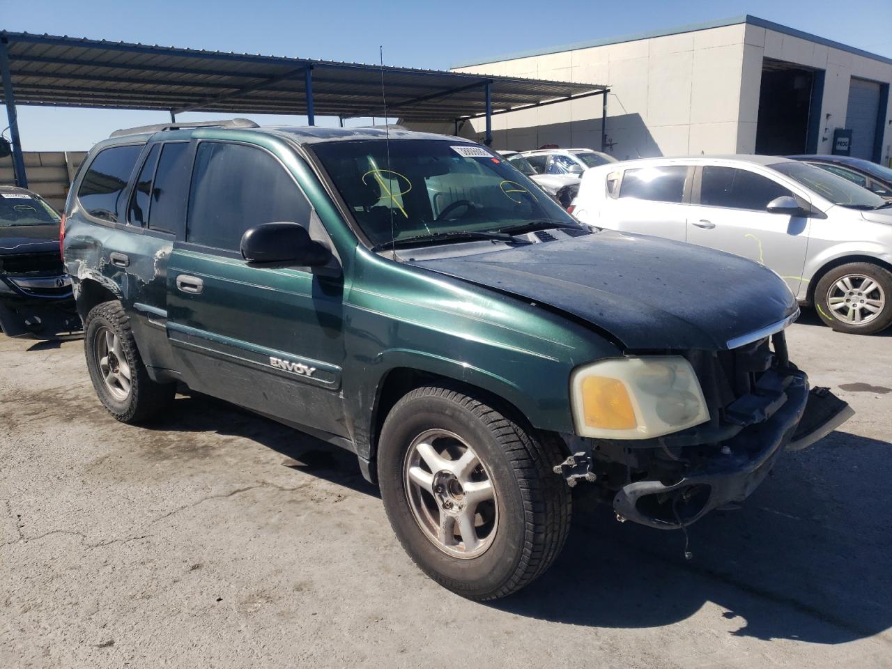 GMC ENVOY 2004 with VIN 1GKDS13S342308213 - Photo from auction