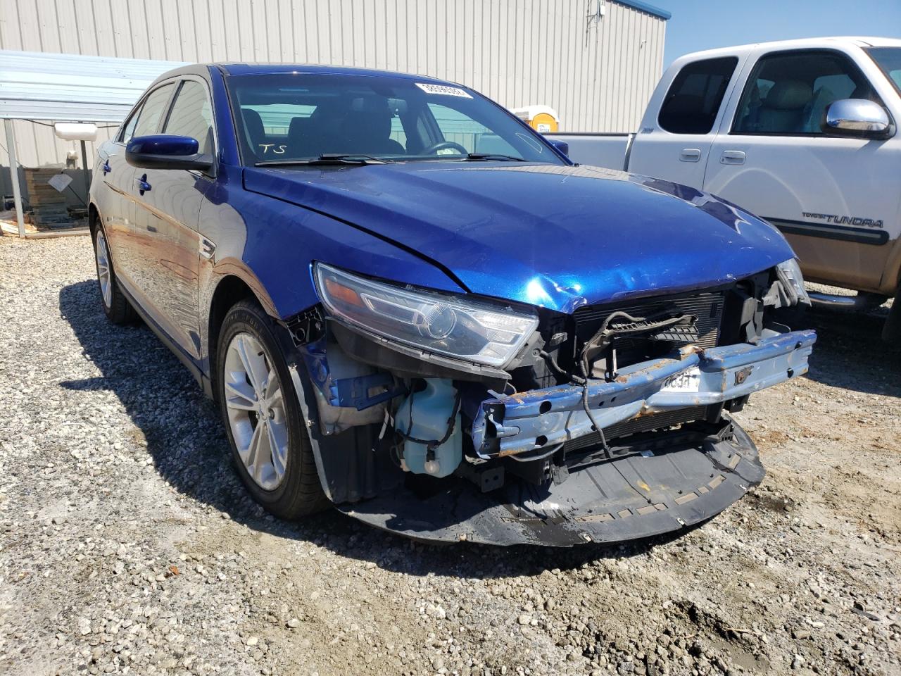 FORD TAURUS SEL 2015 with VIN 1FAHP2E80FG188775 - Photo from auction
