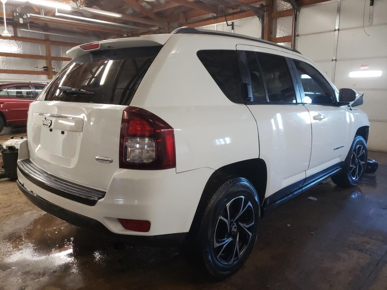 Photo 4 from auction – 2016 JEEP COMPASS LA with VIN 1C4NJCEA4GD734665