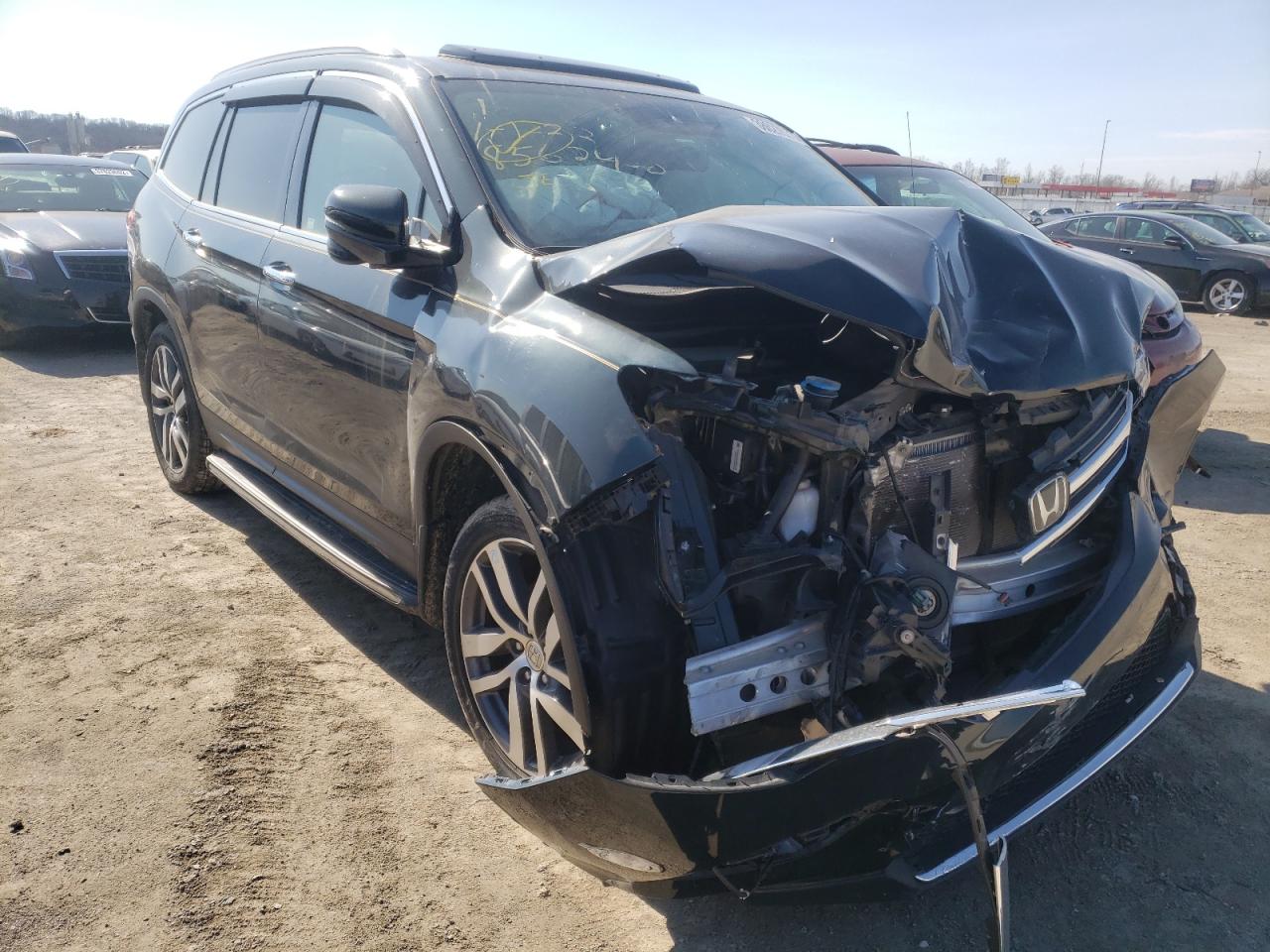 HONDA PILOT TOUR 2017 with VIN 5FNYF5H93HB002808 - Photo from auction