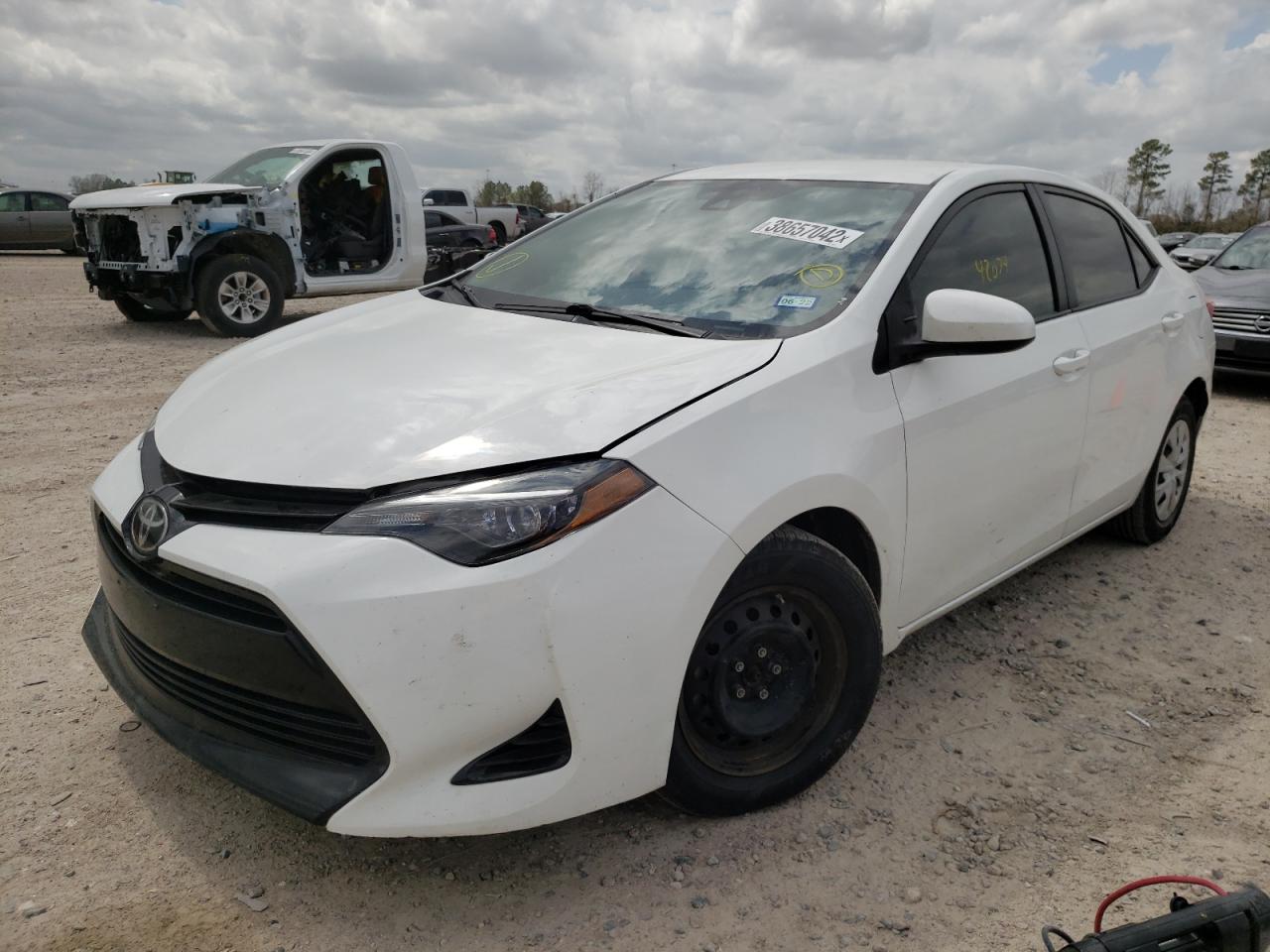 Photo 2 from auction – 2018 TOYOTA COROLLA L with VIN 5YFBURHE8JP778670