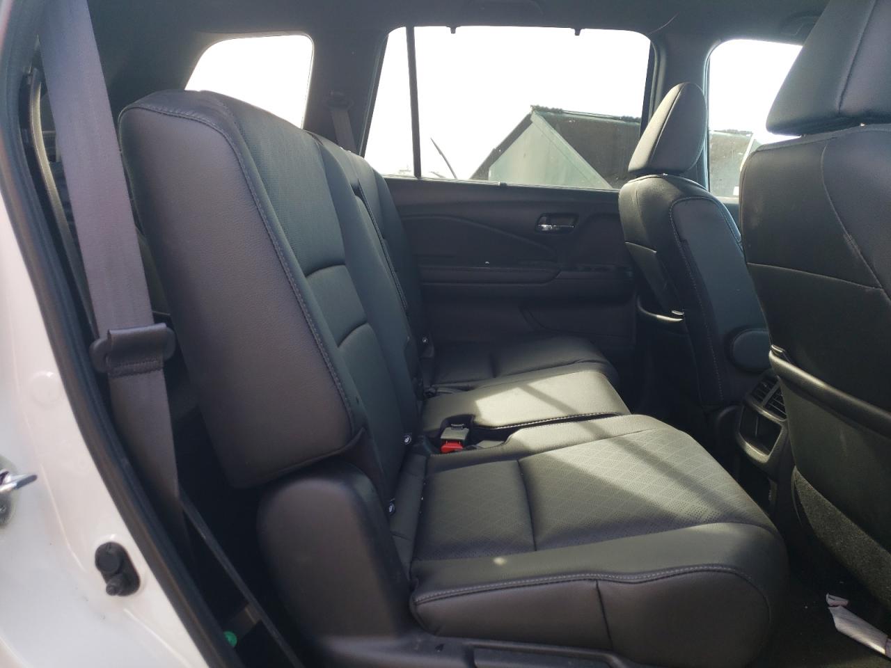 Photo 6 from auction – 2021 HONDA PASSPORT E with VIN 5FNYF8H55MB008733