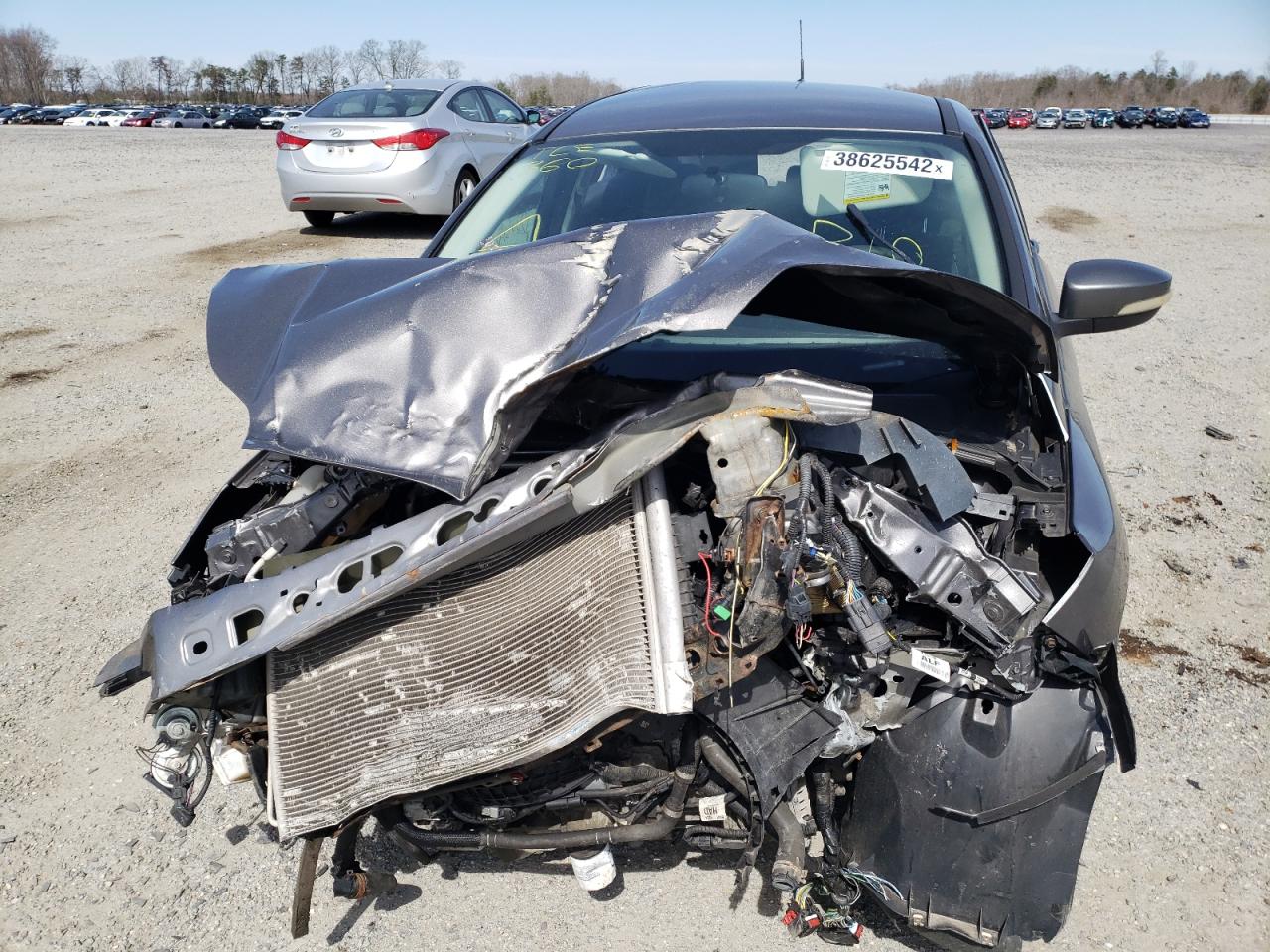 Photo 9 from auction – 2013 FORD FOCUS SE with VIN 1FADP3K26DL155997