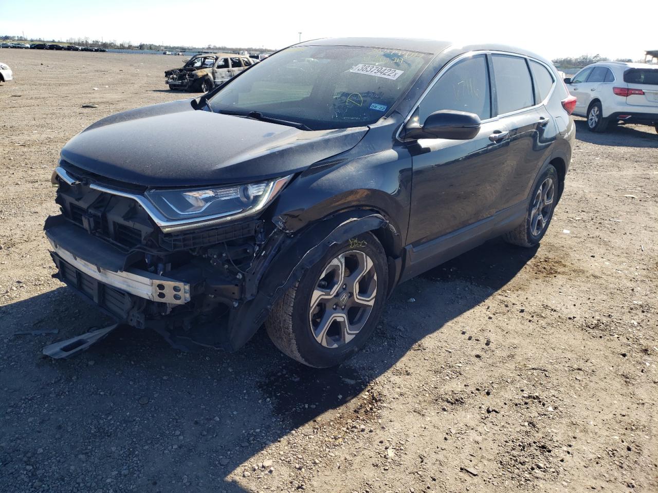 Photo 2 from auction – 2017 HONDA CR-V EX with VIN 7FARW1H58HE031624