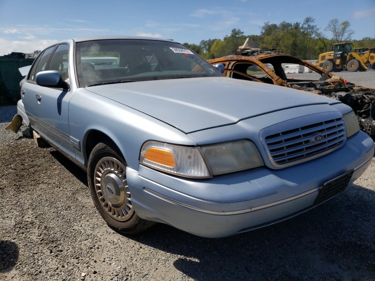 FORD CROWN VICT 2000 with VIN 2FAFP73W9YX100860 - Photo from auction