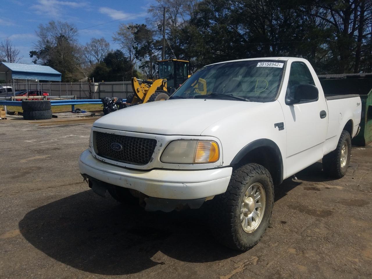 Photo 2 from auction – 2000 FORD F150 with VIN 1FTRF18W8YNA73104
