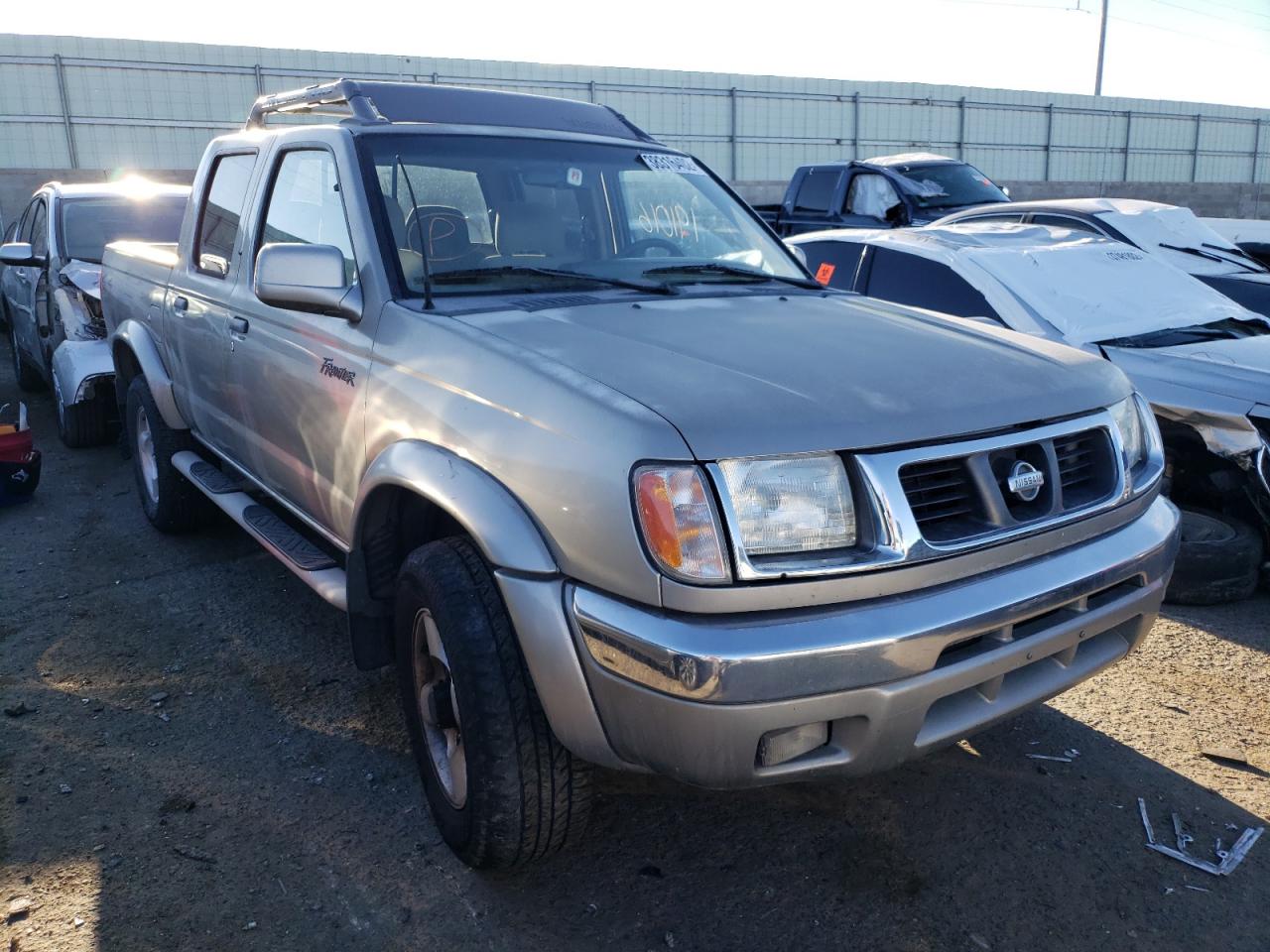 NISSAN FRONTIER C 2000 with VIN 1N6ED27Y0YC363911 - Photo from auction