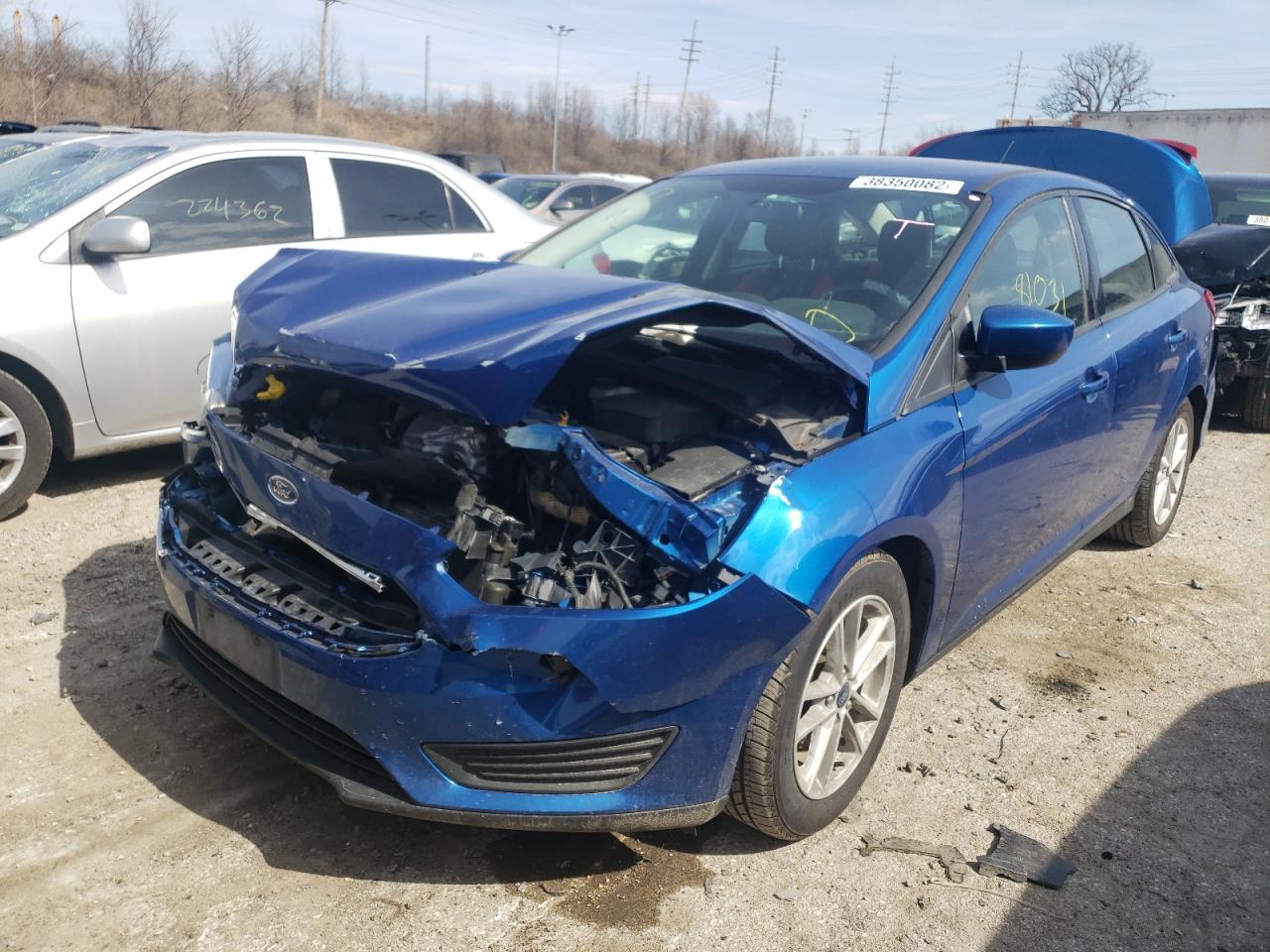 Photo 2 from auction – 2018 FORD FOCUS SE with VIN 1FADP3FE7JL259902